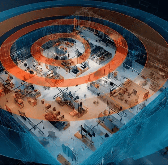 Aerial view of a warehouse or manufacturing facility with digital twin visualization, featuring concentric blue and orange rings overlaying the industrial floor plan to represent signal coverage.