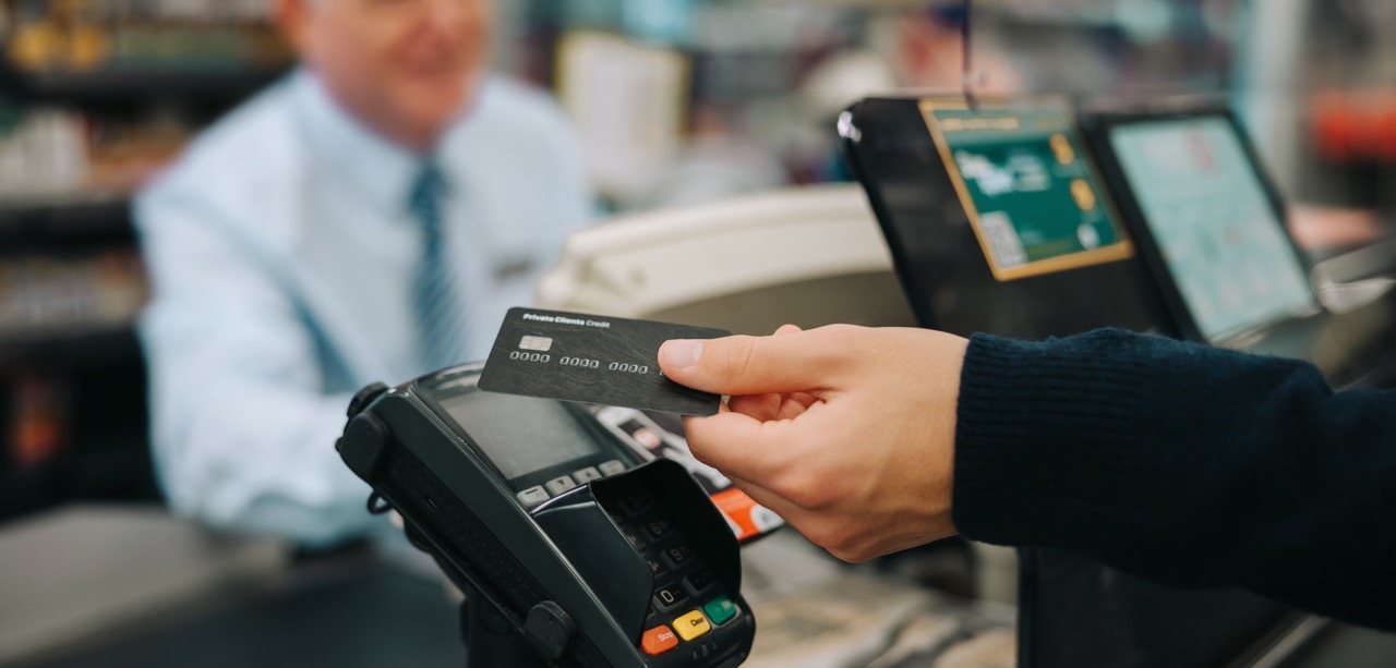 close-up photo of contactless payment point of sale system at retail store