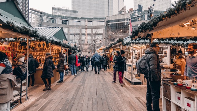outdoor holiday market with vendors using POS